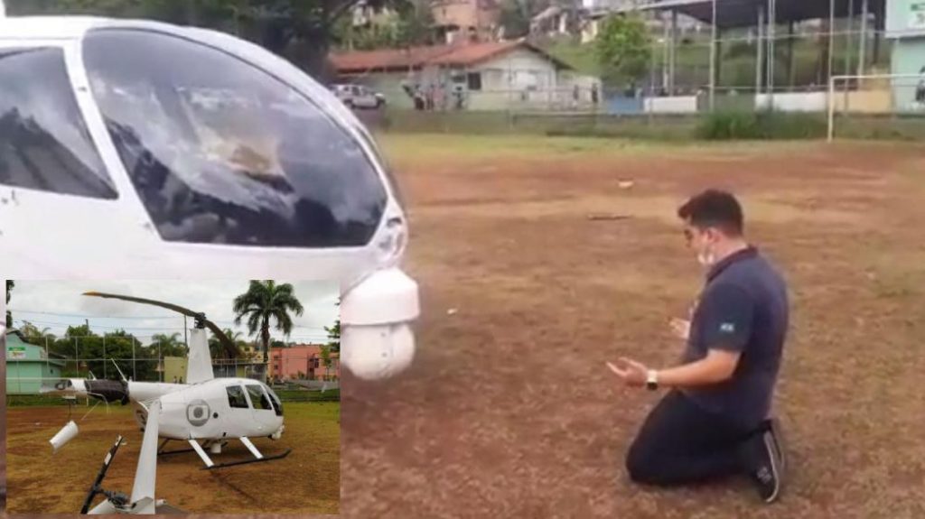 Piloto reza em frente a helicóptero da Globo após pouso forçado em MG